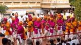 Youth add to the festivities with devotional folk music