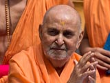 Swamishri in a divine, jovial mood