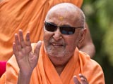 Swamishri in a divine, jovial mood