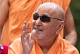 Swamishri in a divine, jovial mood