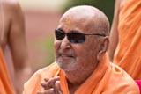 Swamishri in a divine, jovial mood
