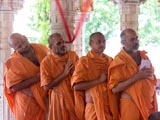  Sadhus doing darshan in the mandir