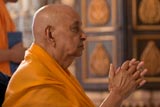  Swamishri engrossed in darshan of Thakorji 
