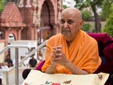  Swamishri engrossed in darshan