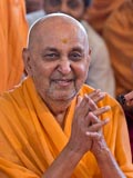 Swamishri in a divine, jovial mood