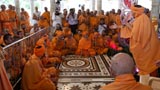 Swamishri with sadhus in the mandir