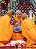  Sadhus honor Swamishri with garlands