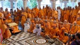 Swamishri in a jovial mood with sadhus in the mandir