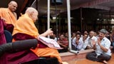  Swamishri interacts with a devotee