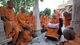  Swamishri interacts with sadhus in the mandir pradakshina