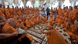  Swamishri with sadhus beneath the mandir dome