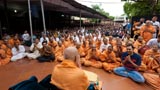 Sadhus and devotees doing darshan of Swamishri
