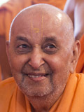 Swamishri in a divine, jovial mood