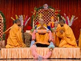  Sadhus honor Swamishri with garlands