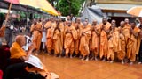  Sadhus doing darshan of Swamishri amidst rain