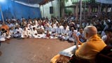 Youths sing kirtan in the traditional 'ochhchhav' style