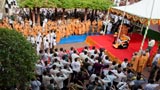  Swamishri, sadhus and devotees salute during the national anthem