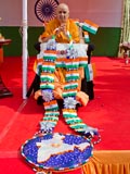  Senior sadhus honor Swamishri with a garland