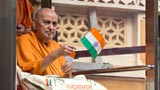  Swamishri waves the Indian tricolor 