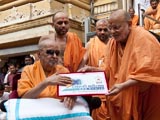  Swamishri blessing the 'Tri-Dashabdi Mahotsav' of Akshar-Purushottam Chhatralaya (APC), Atladra, celebrating its 30th anniversary