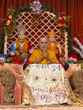  Sadhus honor Swamishri with a shawl