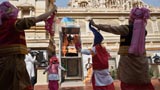  Youths perform a bhangra dance before Swamishri