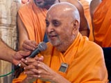 Swamishri in a divine, jovial mood