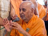 Swamishri in a divine, jovial mood