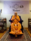  Swamishri is honored with a garland 
