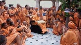  Swamishri with sadhus in the mandir pradakshina