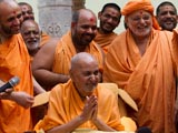  Swamishri with sadhus in the mandir pradakshina