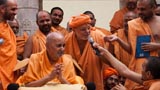  Swamishri with sadhus in the mandir pradakshina