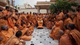  Swamishri with sadhus in the mandir pradakshina