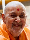 Swamishri in a divine, jovial mood