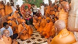  Swamishri with sadhus beneath the mandir dome