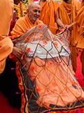  Senior sadhus honor Swamishri with a shawl