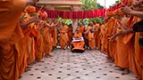  Swamishri in a festive mood with sadhus in the mandir pradakshina