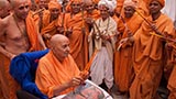  Swamishri in a festive mood with sadhus in the mandir pradakshina