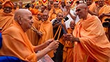  Swamishri in a festive mood with sadhus in the mandir pradakshina