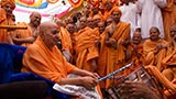  Swamishri in a festive mood with sadhus in the mandir pradakshina