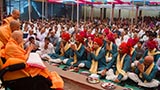 Swamishri blesses devotees who have gathered for darshan and participation in the murti pratishtha ceremony