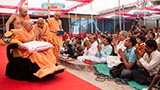 Swamishri blesses devotees who have gathered for darshan and participation in the murti pratishtha ceremony