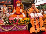  Senior sadhus honor Swamishri with a garland
