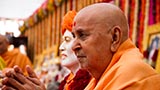  Senior sadhus honor Swamishri with a garland