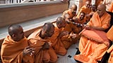  Swamishri blesses sadhus in the mandir pradakshina with the peace stick
