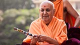  Swamishri blesses sadhus in the mandir pradakshina with the peace stick