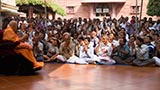  Devotees enjoy the darshan of Swamishri holding aloft the Masai peace stick
