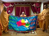  Sadhus honor Swamishri with a shawl