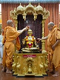  Senior sadhus perform abhishek of Bhagwan Swaminarayan (abhishek murti)