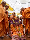  Senior sadhus honor Swamishri with a garland